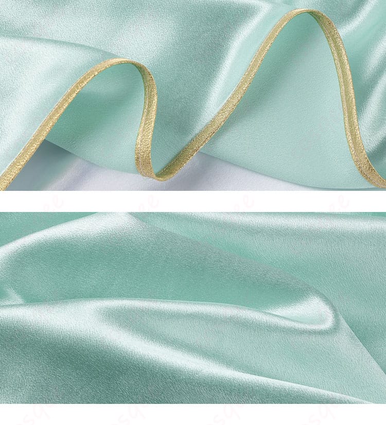 衣裾の装飾細節画像。衣装の裾に施された装飾が高級感を引き立てます。