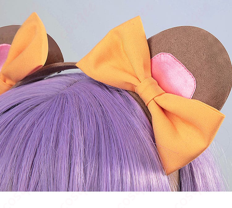 ヘアピンと蝶結びアクセサリー詳細画像 - ヘアアクセサリーのディテールと蝶結びが華やかさを加える。