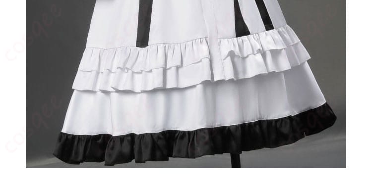 氷上メルル スカート裾の装飾アップ。繊細な刺繍風ディテールと重ね布の質感が映える近接写真。