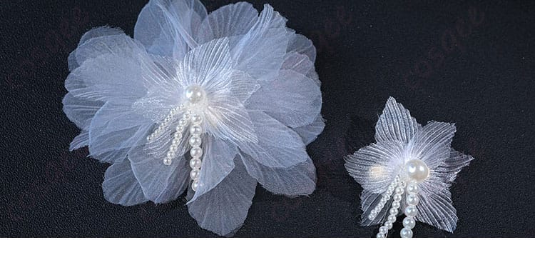 ジャンヌ・ダルク灯花の祝装聖女を彩る花飾りのディテール